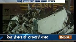 Watch rail engine hits car