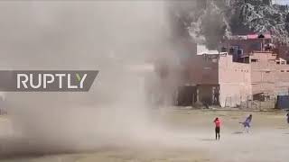 A whirlwind start? Dust devil rolls across Bolivian football pitch before kick-off