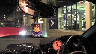 Supercars driving in London at night
