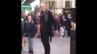 Street performer gets his pants pulled down