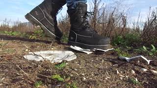 Timberland Pro Mining boots stomp, trample and destroy 2 plates in dirt