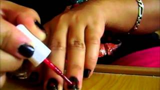 Uñas decoradas (negro, rojo,blanco)