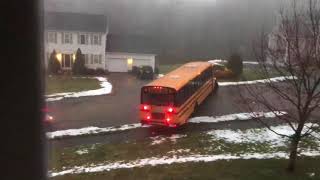 School bus slides down icy road during morning pickup