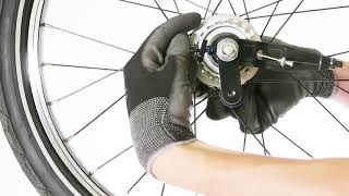 Comment changer la roue arrière sur un vélo pliant Tilt ?