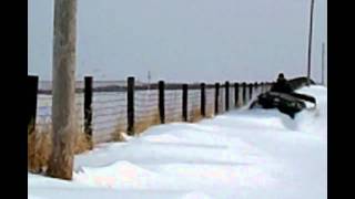 AMPHIBIOUS 6X6 ARGO 650 HD WITH ADAIR TRACKS IN SNOW