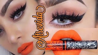 LOOK ATREVIDO PARA VERANO DELINEADO PIN UP  LABIOS NARAJA