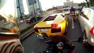 Honda CBR 1000 RR & Suzuki SV1000s tailing a Lamborghini Murcielago