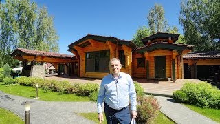 Одноэтажный коттедж из элитного клееного бруса с летним бассейном в поселке Высота на берегу реки