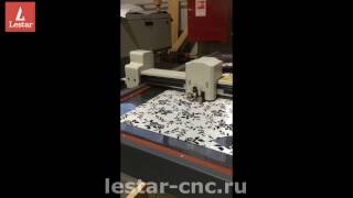 Раскрой ткани на основе ПВХ пленки 0,3 мм на планшетном режущем плоттере Lestar
