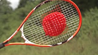 Tennis Racket vs Water Balloons at 25,000 fps Slow Motion