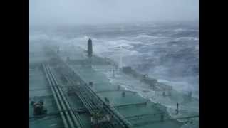 Large super tanker ship in huge storm in Atlantic Ocean