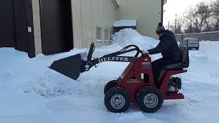 Чистка снега погрузчиком Helffer MSV102