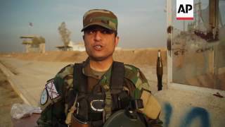 Christian militia patrol Iraq city taken from IS