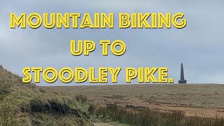 mountain biking on a very windy day up stoodley pike
