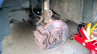 Changing front Brake Pads and Discs Vauxhall Corsa D