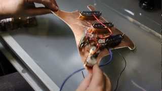 Wiring a Fender Stratocaster - fitting pickups and volume and tone controls.