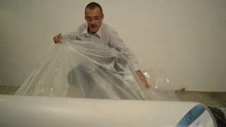 Déballage d'un matelas compressé