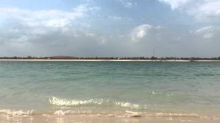 Sitting on Corniche Beach Abu Dhabi | Jeddah Corniche | Abu Dhabi Beaches