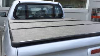 Установка жесткой трехсекционной крышки на Mitsubishi L200 2014 Обзор. особенности.