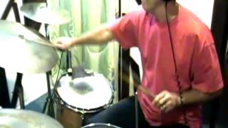 Drummer playing over School of Samba
