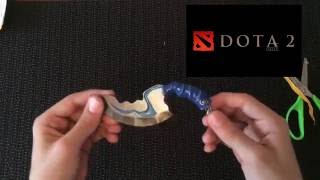 интересные посылки. Нож визитка, брелок дота 2 blink dagger, фигурка футболиста, мячик антистресс.
