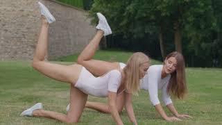 Hot Yoga Girls Nancy A and Sybil Squats Morning Workout