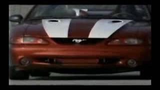 Red Mustang Convertible Kicking Butt