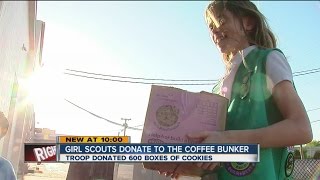 Girl scouts donate cookies to veterans