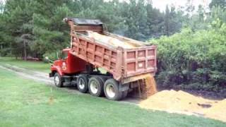 Spreading Sand with the dump truck