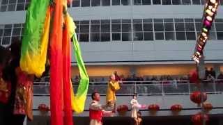 Chinese Opera with big dolls, each played by a puppeteer
