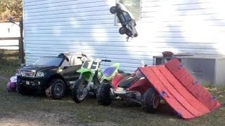 High Volts RC - Short Course Truck Jumps over 4 Power Wheels