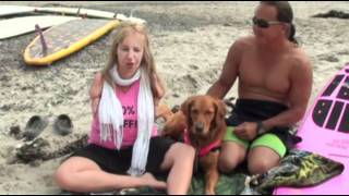 Surf dog Ricochet brings armless surfer, Sabine together with Pro tandem surfer, Guy Takayama