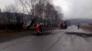 укладка асфальта под дождем