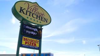 City Approves Demolition of Village Shopping Center building