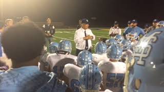Mona Shores coach Matt Koziak talks to team after win against Zeeland West
