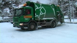 Garbage truck Scania collect garbage outside Visby 2012