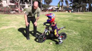 Kid Riding Oset 12.5 Electric Trials Bike